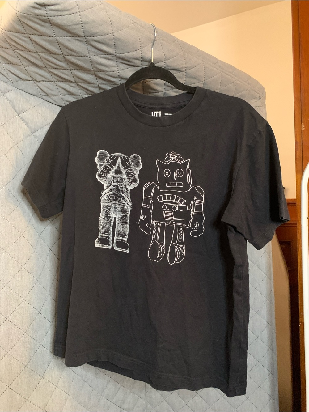 Uniqlo Black Graphic Tee with White Robot and Character Sketch